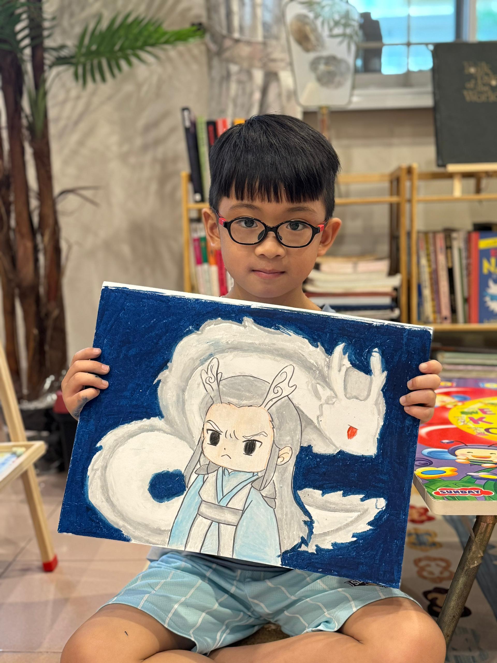 Student sharing dragon artwork