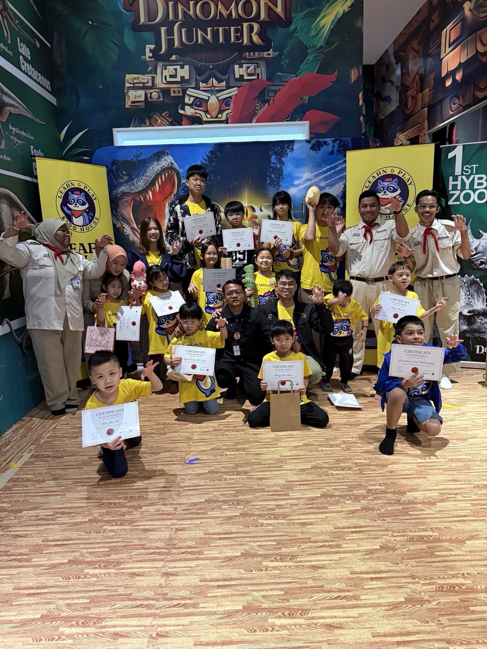 Team celebration at Dino Lab Academy